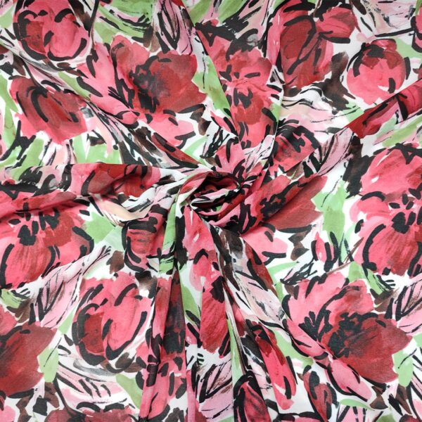 Tessuto Georgette a fantasia motivo floreale rosso - nero - geranio