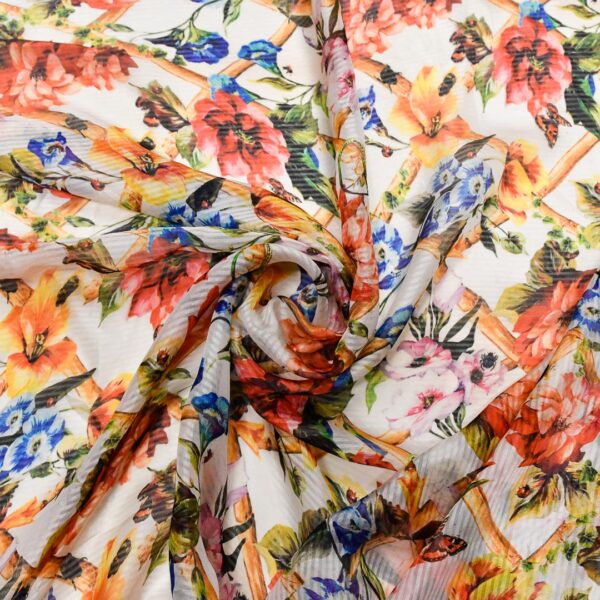 Tessuto Georgette a fantasia motivo floreale giallo - rosso - blu