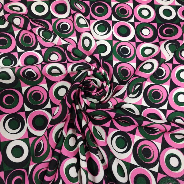 Tessuto Georgette a fantasia motivo geometrico fucsia - nero - bianco
