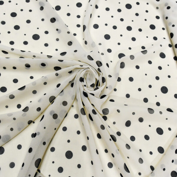 Tessuto Georgette a fantasia motivo pois panna  - nero