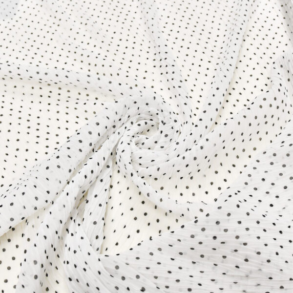 Tessuto Georgette a fantasia motivo pois piccoli bianco - nero