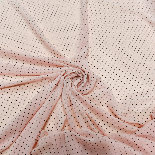 Tessuto Georgette a fantasia motivo pois piccoli nero - rosa