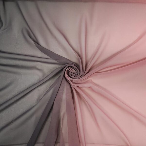 Tessuto Georgette a fantasia motivo sfumato nero - rosa