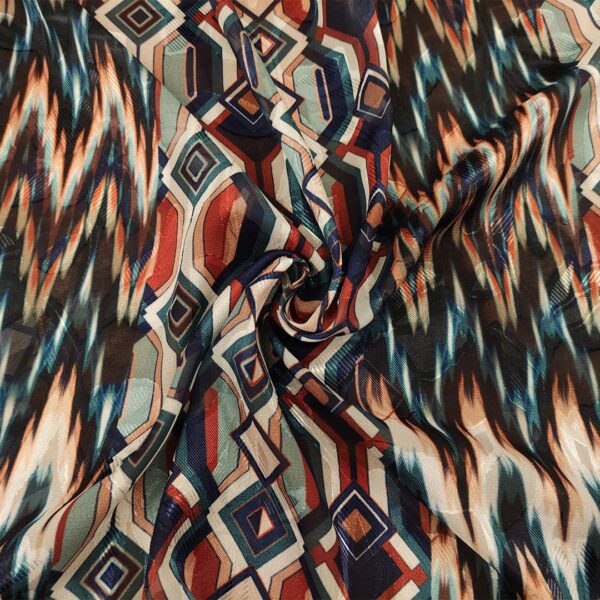 Tessuto Georgette devorè a fantasia motivo astratto cuoio - ottanio - blu