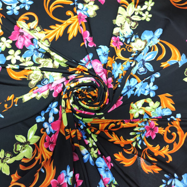Tessuto Jersey a fantasia motivo floreale nero - turchese - fucsia - ocra