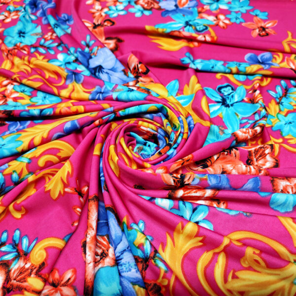 Tessuto Jersey a fantasia motivo floreale turchese - fucsia - ocra