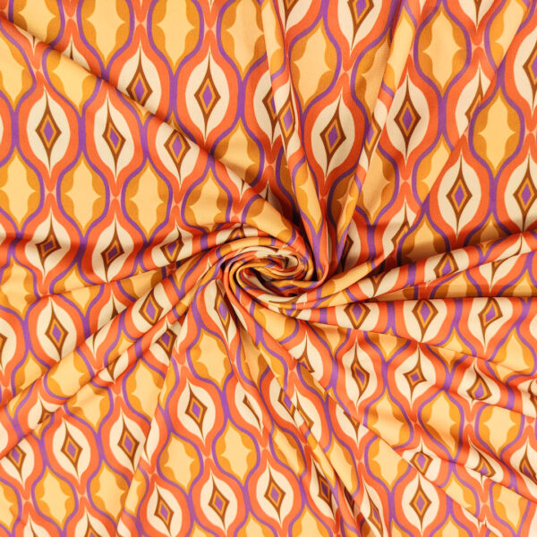 Tessuto Jersey a fantasia motivo geometrico arancio - ocra - marrone