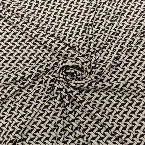 Tessuto Jersey a fantasia motivo geometrico bianco - nero
