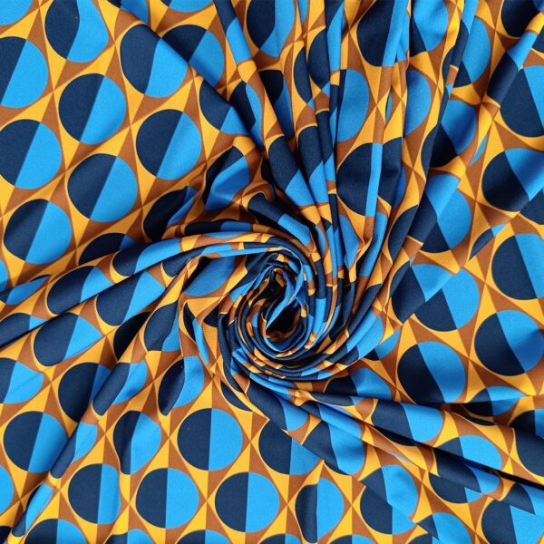 Tessuto Jersey a fantasia motivo geometrico blu - turchese - tabacco