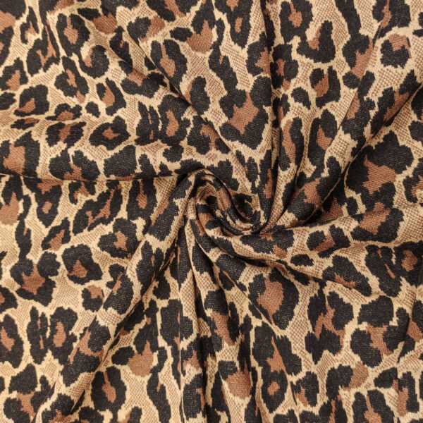 Tessuto Maglia Mano Lana a fantasia motivo animalier marrone - beige - nero