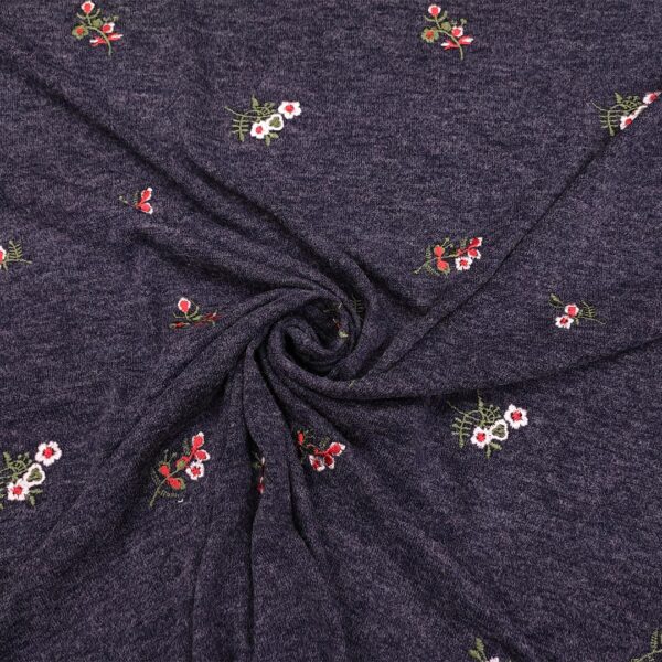 Tessuto Maglia Mano Lana ricamata motivo floreale blu jeans