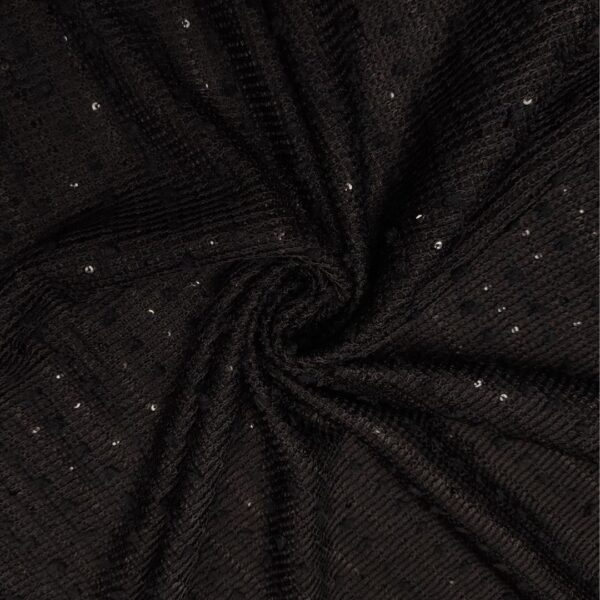 Tessuto Maglia Mano Lana ricamato con paillettes tinta nero