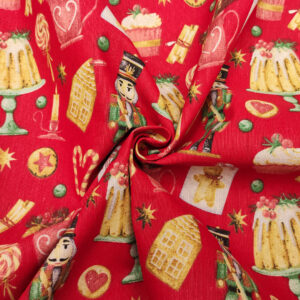 Tessuto Misto Cotone decorativo natalizio motivo schiaccianoci e biscotti rosso - verde - giallo