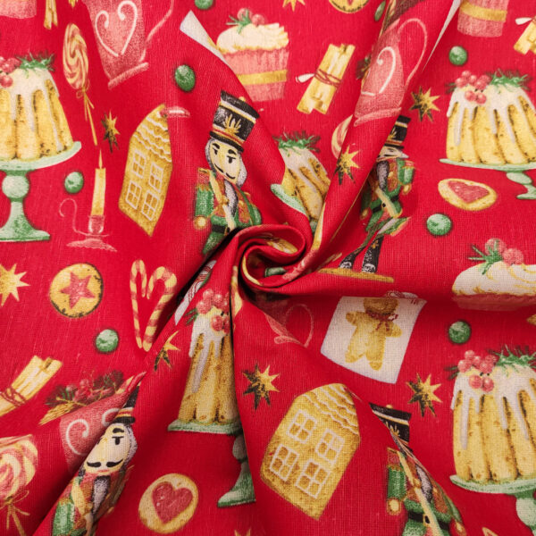 Tessuto Misto Cotone decorativo natalizio motivo schiaccianoci e biscotti rosso - verde - giallo