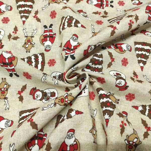 Tessuto Misto Cotone per arredo natalizio a fantasia con babbo natale e renne beige - rosso - marrone