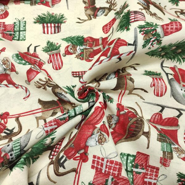 Tessuto Misto Cotone per arredo natalizio a fantasia con babbo natale e renne beige - rosso - verde