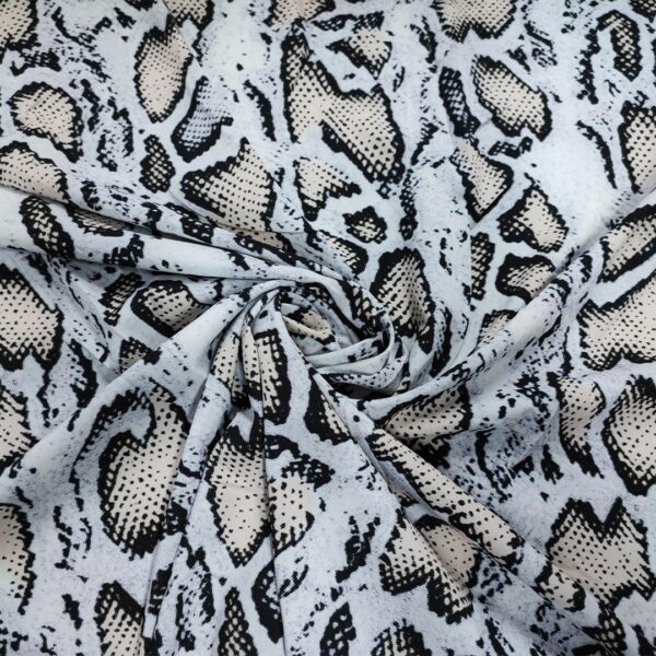 Tessuto Misto Viscosa a fantasia motivo beige - nero - bianco