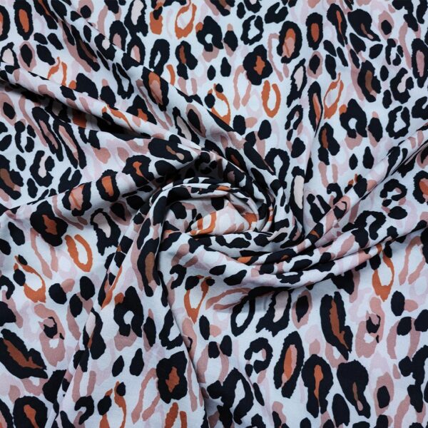 Tessuto Misto Viscosa a fantasia motivo animalier ruggine - beige - nero