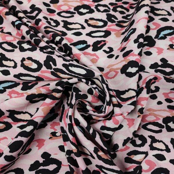 Tessuto Misto Viscosa a fantasia motivo animalier nero - rosa - geranio