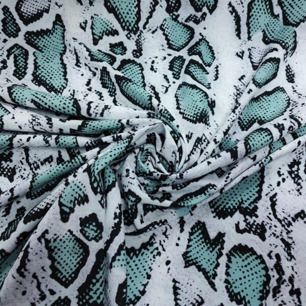Tessuto Misto Viscosa a fantasia motivo animalier verde salvia - nero - bianco