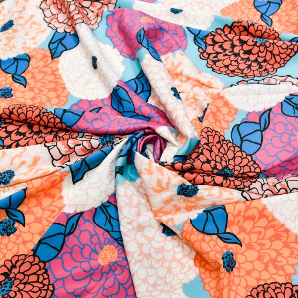 Tessuto Misto Viscosa a fantasia motivo floreale turchese - fucsia - arancione