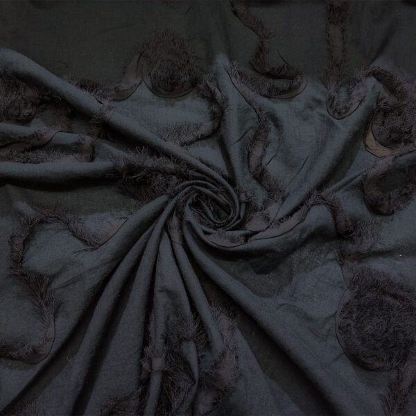 Tessuto Mussola di Cotone ricamato tinta unita nero