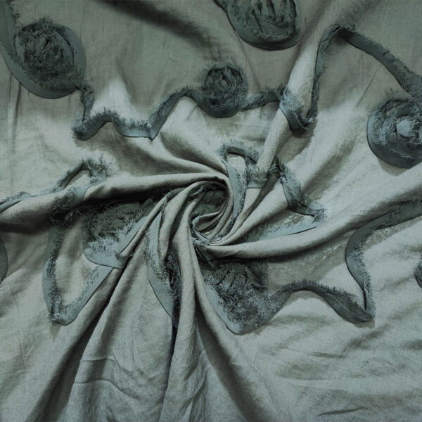 Tessuto Mussola di Cotone ricamato tinta unita verde militare