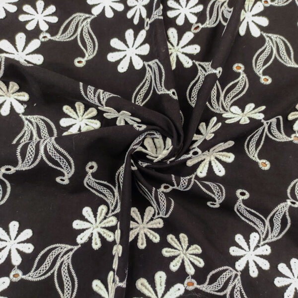 Tessuto Mussola di Cotone ricamato motivo floreale nero - bianco