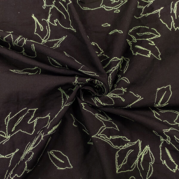 Tessuto Mussola di Cotone ricamato motivo floreale nero - verde