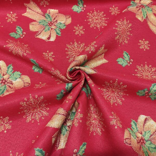 Tessuto per arredo Gobelin lurex natalizio a fantasia con fiocchi rosso - oro - verde