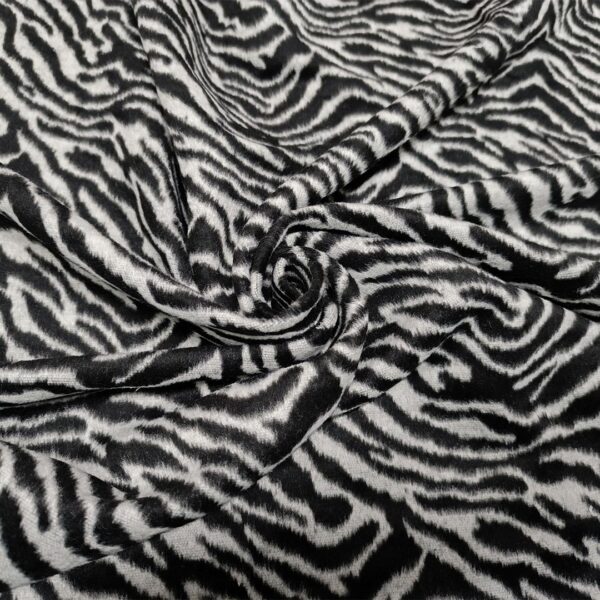 Tessuto per cappotto motivo animalier grigio - nero