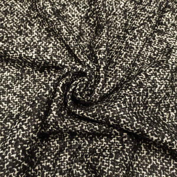 Tessuto per cappotto pettinato mano lana motivo sale e pepe bianco - nero