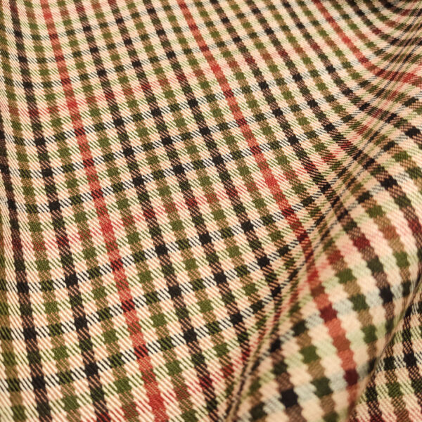 Tessuto pettinato mano lana elasticizzato motivo pied de poule marroncino - verde - rosso
