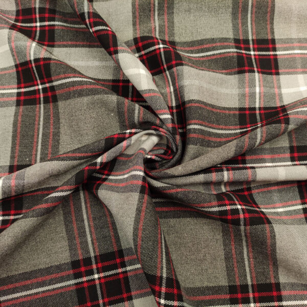 Tessuto pettinato mano lana elasticizzato motivo quadri grigio - rosso - nero