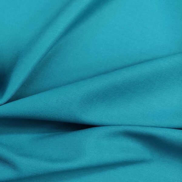 Tessuto Pettinato elasticizzato tinta unita ottanio