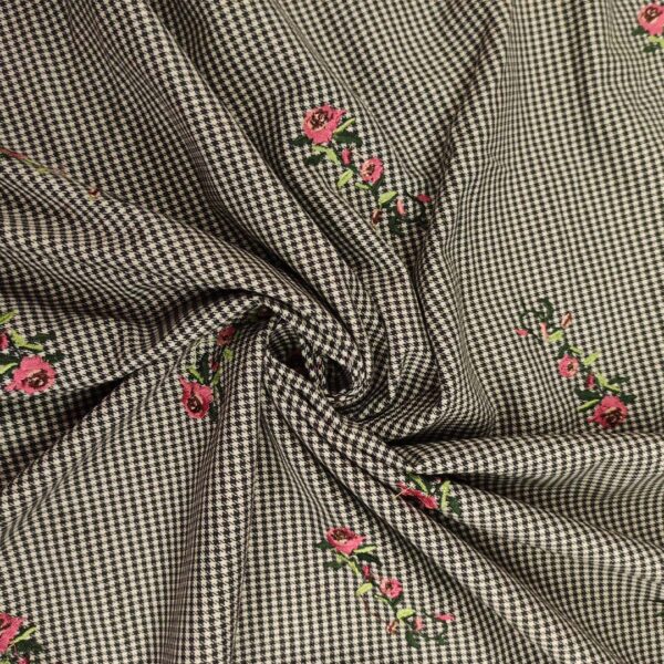 Tessuto pettinato ricamato motivo pied de poule verde - nero - bianco - rosa