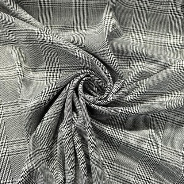 Tessuto pettinato motivo principe di galles nero - grigio