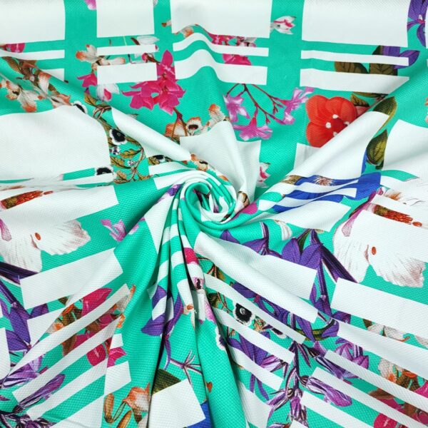 Tessuto Piquet di cotone a fantasia motivo astratto verde tiffany - bianco - fucsia
