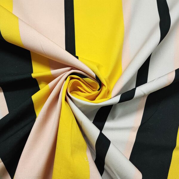 Tessuto Piquet di cotone a fantasia motivo rigato nero - giallo - pesco