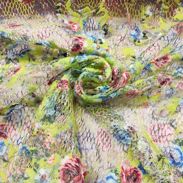 Tessuto pizzo a fantasia motivo floreale verde - bluette - rosso
