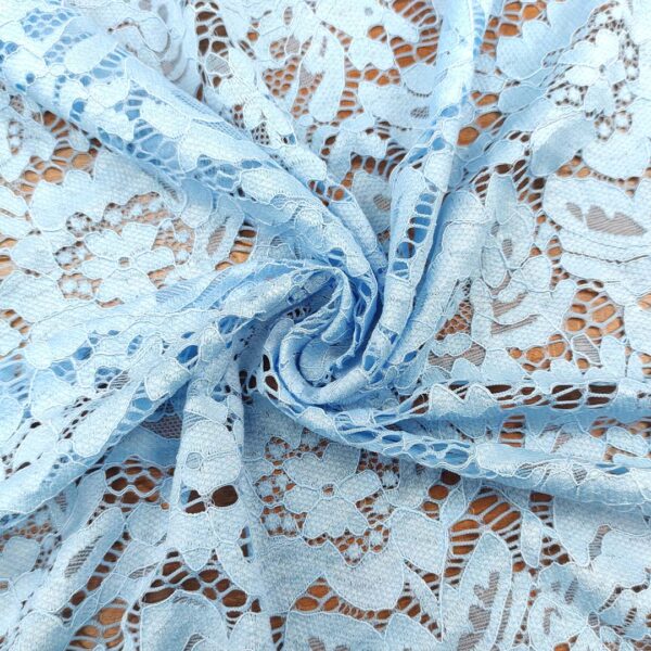 Tessuto pizzo elasticizzato motivo floreale azzurro
