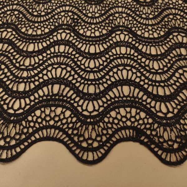 Tessuto Pizzo macramè con glitter motivo astratto nero