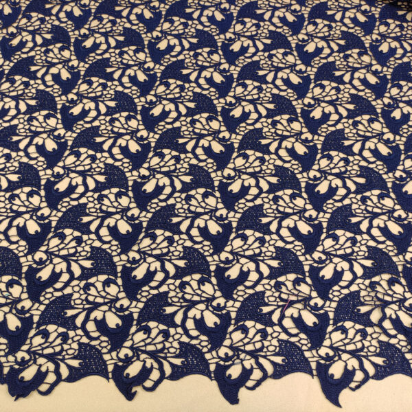 Tessuto Pizzo macramè motivo astratto blu