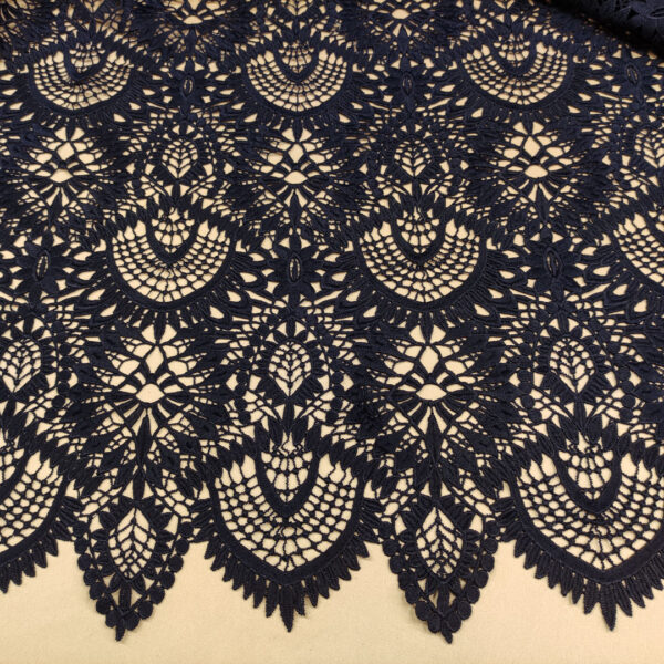 Tessuto Pizzo macramè motivo astratto blu