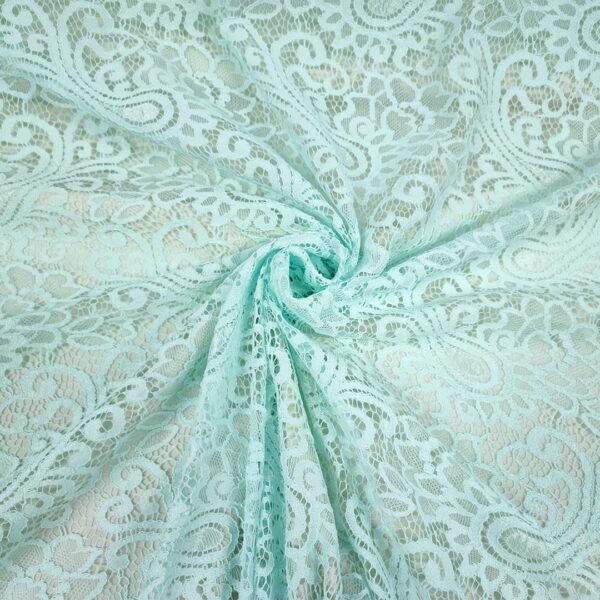 Tessuto pizzo motivo floreale cashmere acquamarina