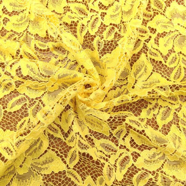 Tessuto pizzo motivo floreale giallo
