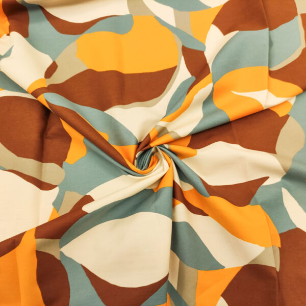 Tessuto Popeline di cotone a fantasia motivo astratto panna - ocra - carta da zucchero