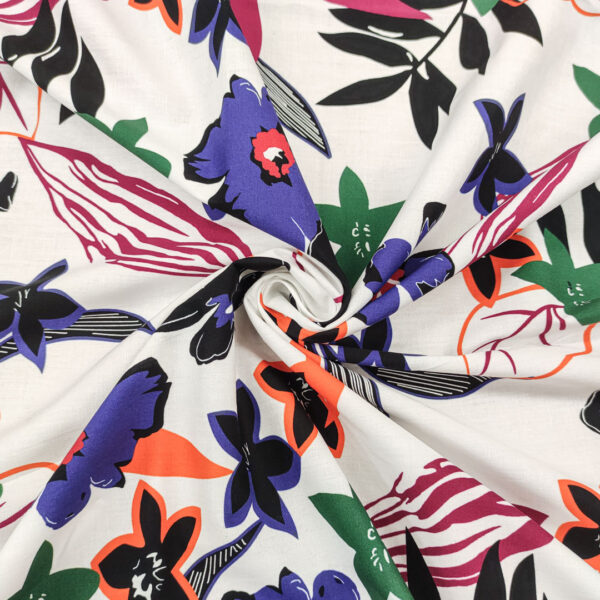 Tessuto Popeline di cotone a fantasia motivo floreale nero - viola - bianco