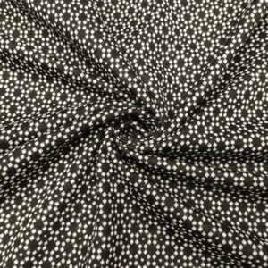 Tessuto Punto Milano a fantasia motivo geometrico nero - bianco