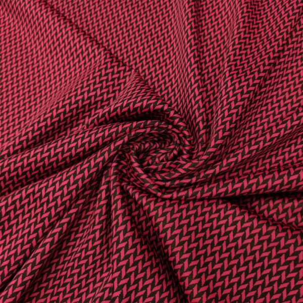 Tessuto Punto Milano a fantasia motivo spigato nero - fucsia